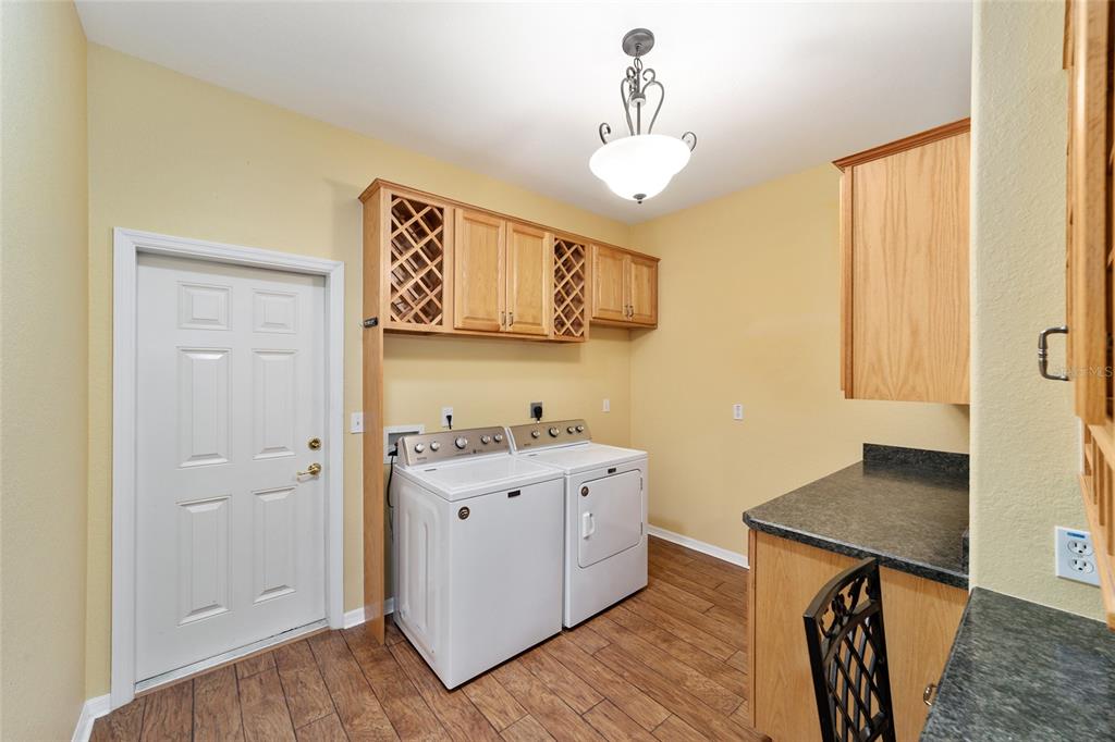 11017 Southwest 71st Terrace Road Ocala, FL 34476 - Photo 36 of 49 a view of a room with closet and wooden floor