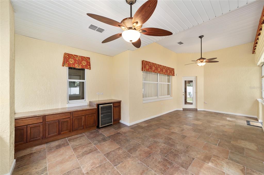 11017 Southwest 71st Terrace Road Ocala, FL 34476 - Photo 41 of 49 a view of an empty room with window and cabinet