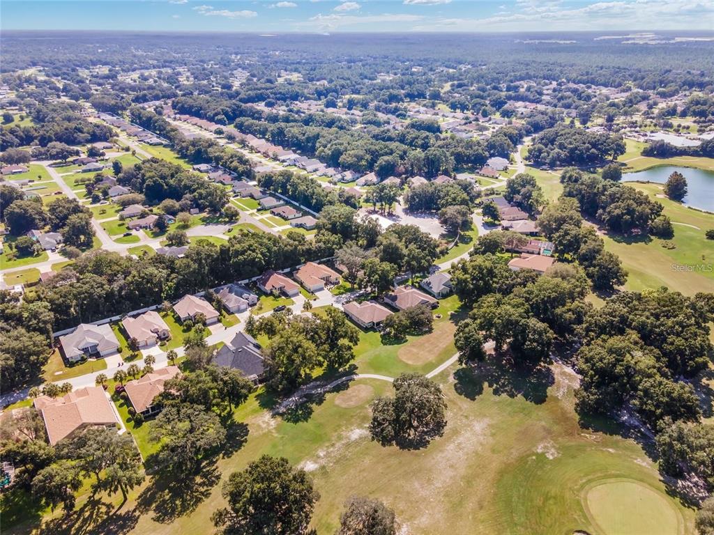 11017 Southwest 71st Terrace Road Ocala, FL 34476 - Photo 46 of 49 an aerial view of residential houses with outdoor space