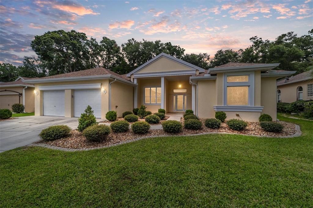 11017 Southwest 71st Terrace Road Ocala, FL 34476 - Photo 49 of 49 a front view of house with yard and green space