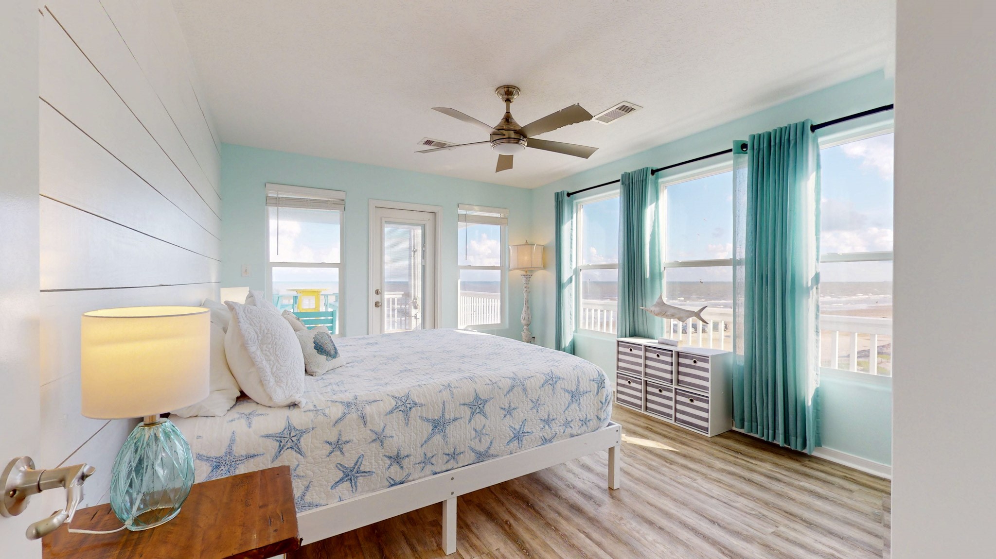 1822 Redfish Lane Crystal Beach, TX 77650 - Photo 15 of 28 a bedroom with a bed mirror and window