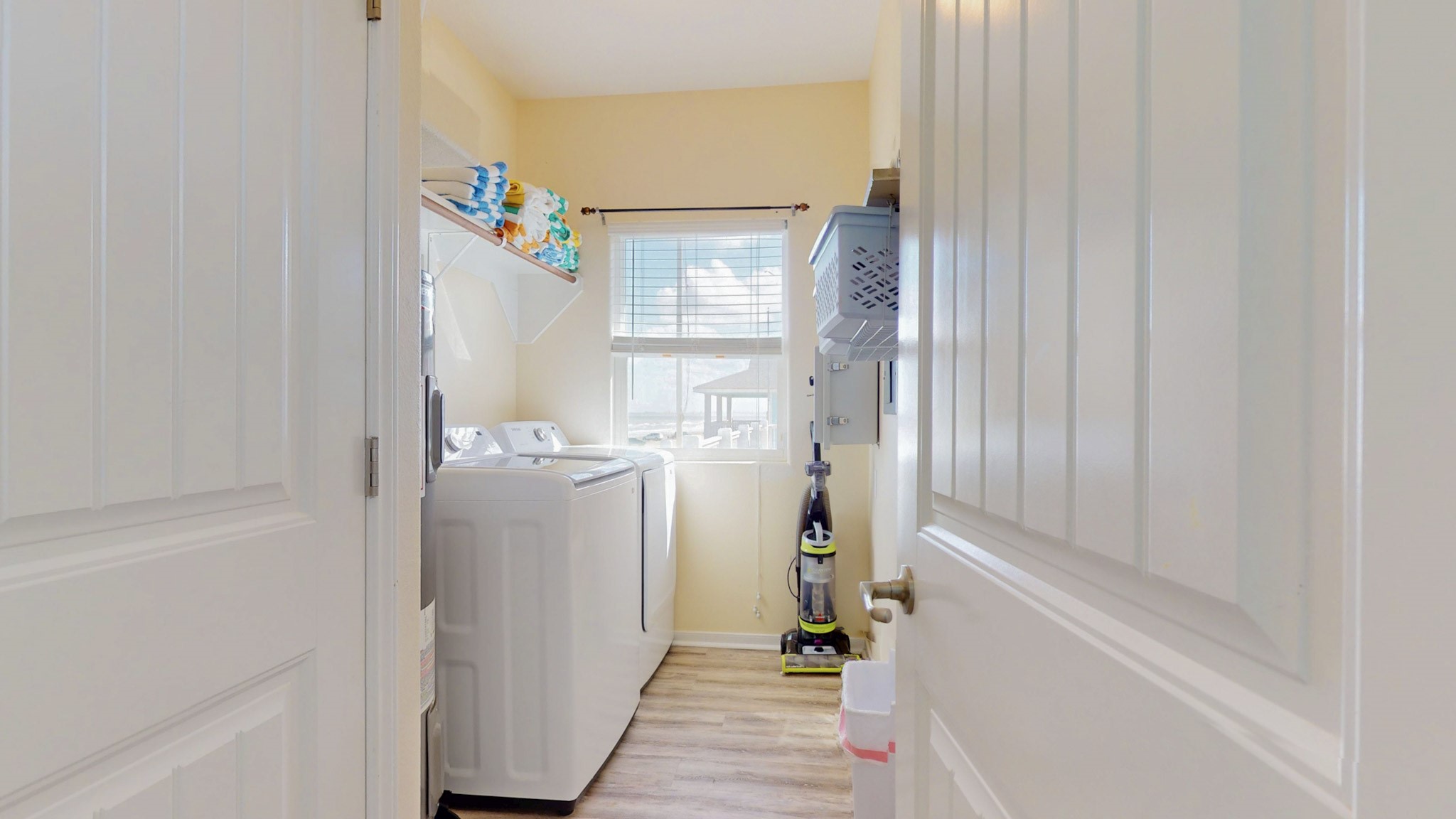 1822 Redfish Lane Crystal Beach, TX 77650 - Photo 23 of 28 a view of a bedroom with a window and storage