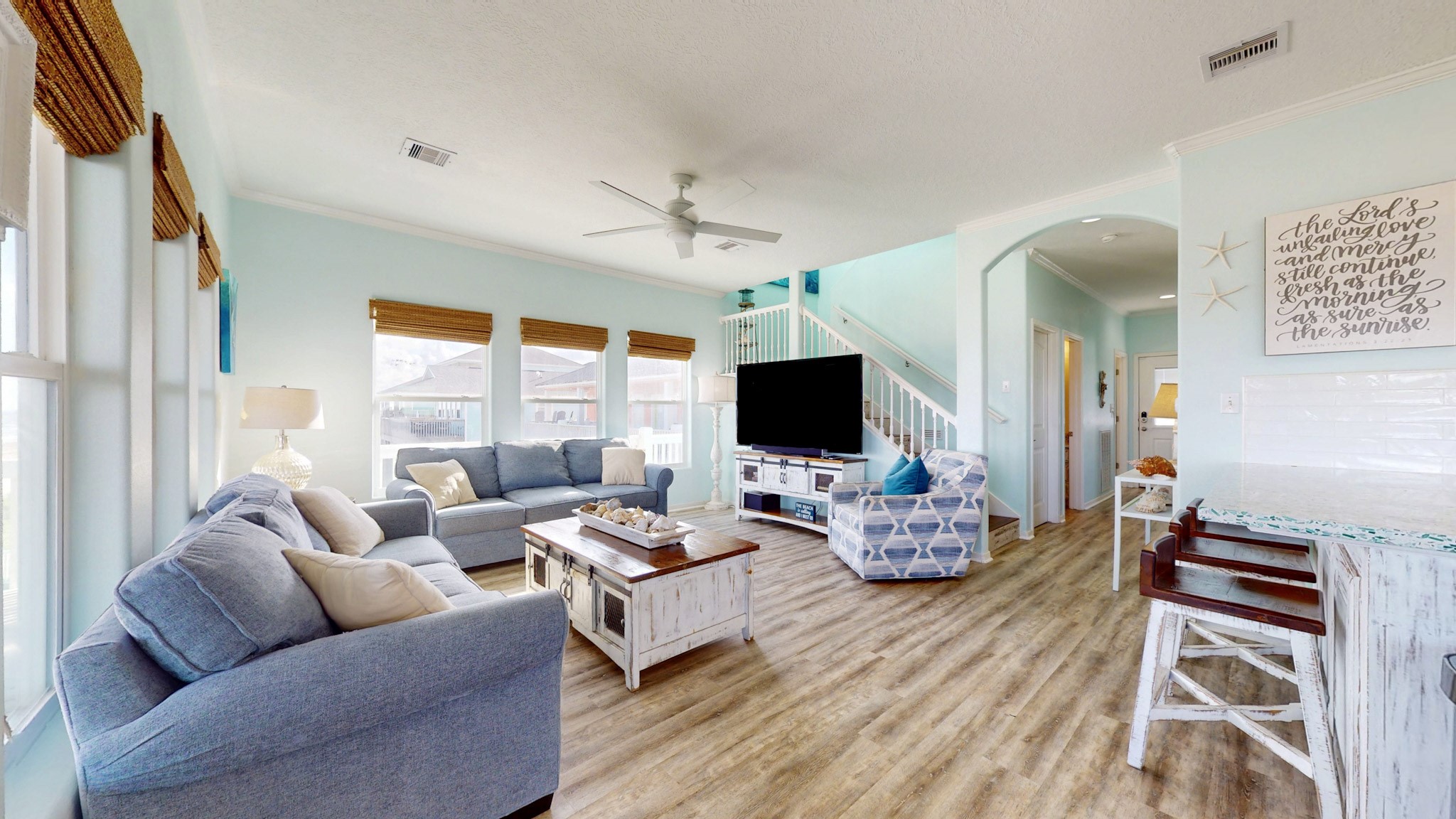 1822 Redfish Lane Crystal Beach, TX 77650 - Photo 6 of 28 a living room with furniture flat screen tv and a large window