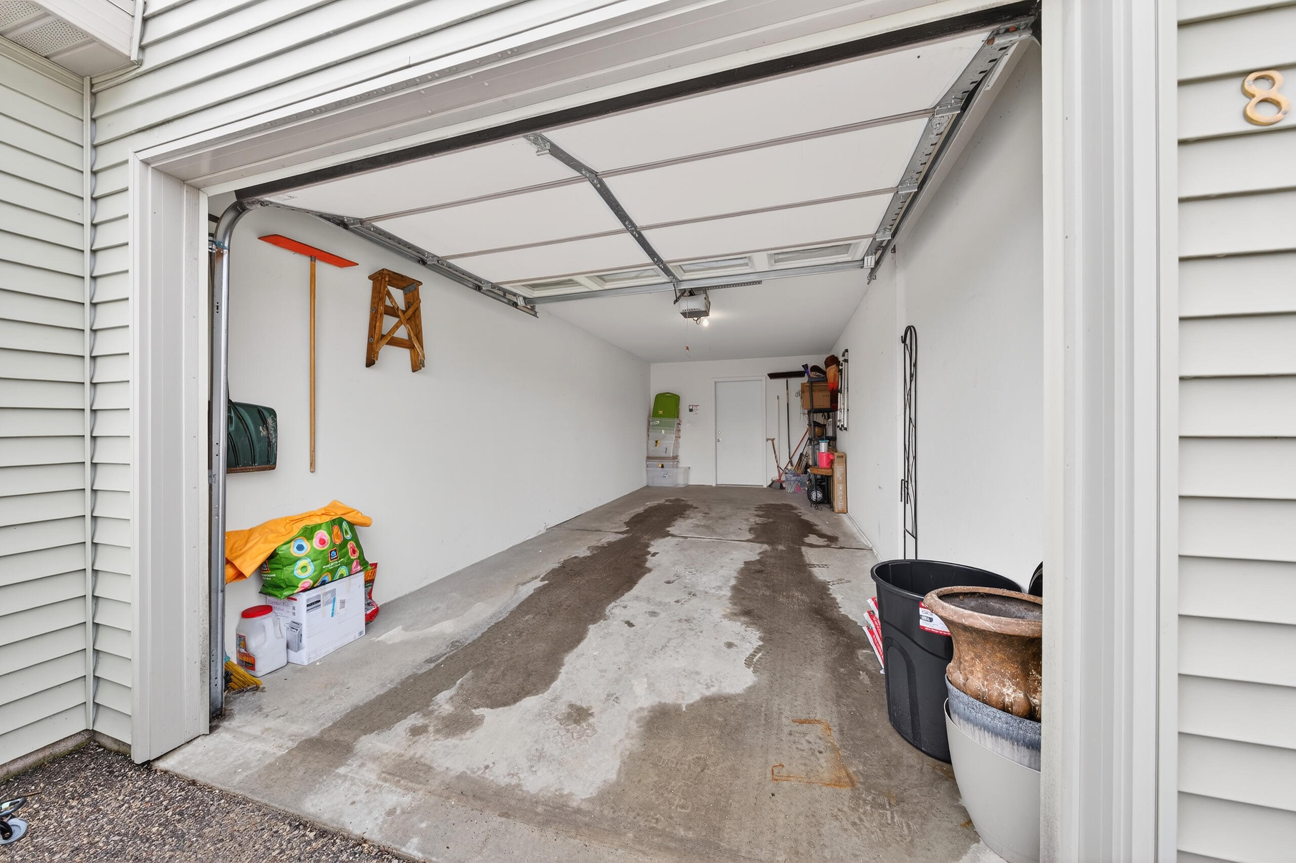 112 Market Square, Unit 152 Wautoma, WI 54982 - Photo 24 of 85 All units have private garages and a parking space outside.