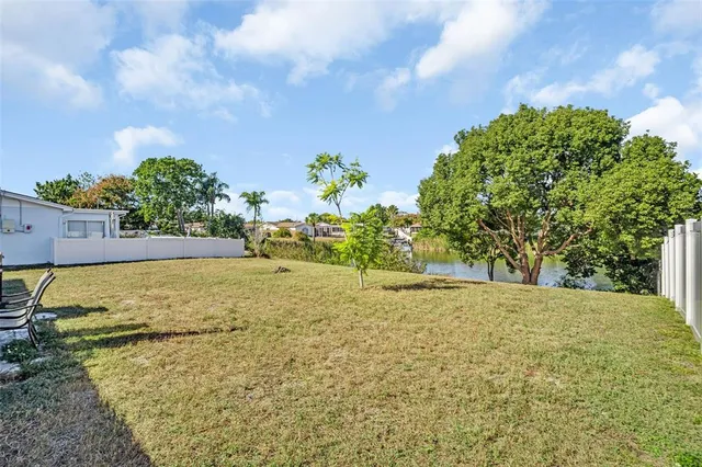 a view of a yard with an trees