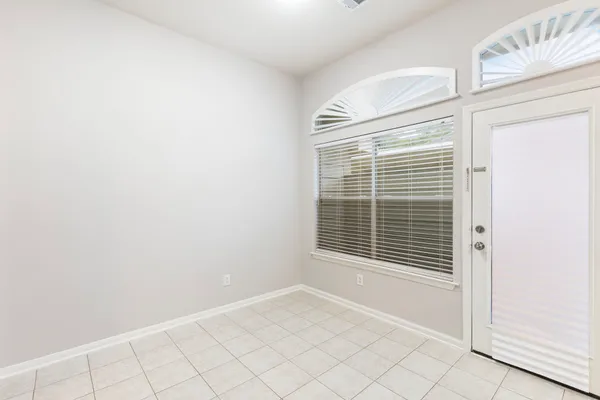 a kitchen with stainless steel appliances a refrigerator sink and cabinets