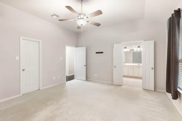 a view of a room with racks on the wall