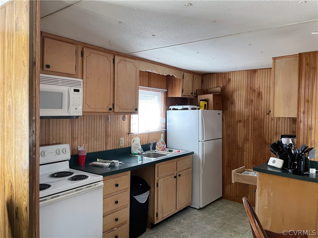 843 Namozine Road Crewe, VA 23930 - Photo 26 of 49 a kitchen with stainless steel appliances a refrigerator stove and sink