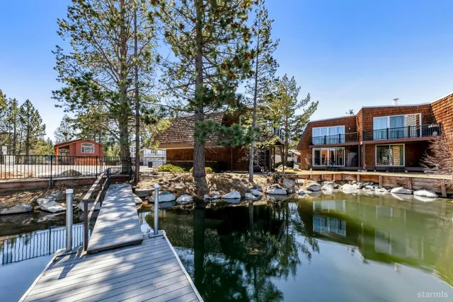 a view of a backyard of a house