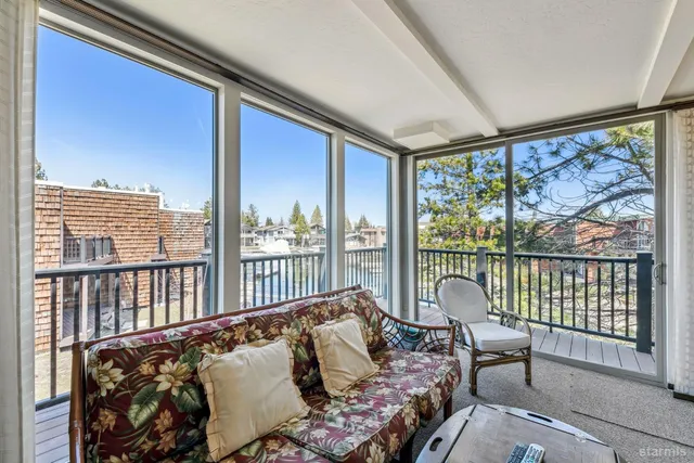 a view of a livingroom with furniture window and outside view