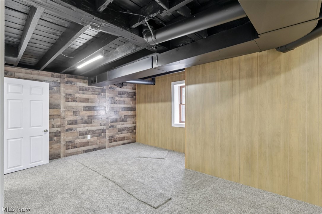 4200 Hattrick Road Rootstown, OH 44272 - Photo 31 of 42 Basement with wooden walls and carpet floors