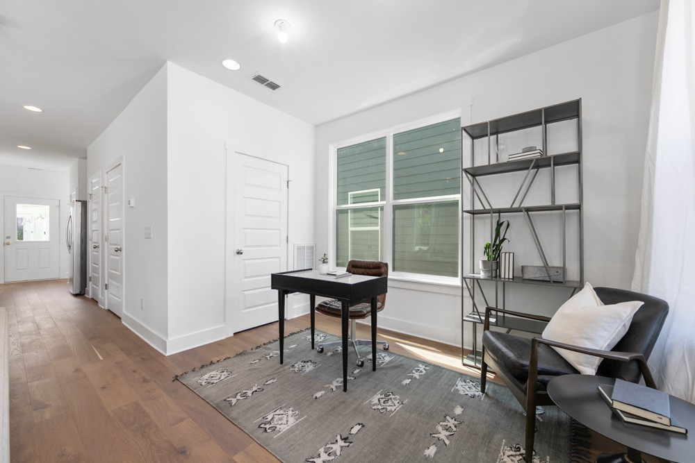 422 Creative Way Madison, TN 37115 - Photo 14 of 42 a view of a workspace with furniture and a window