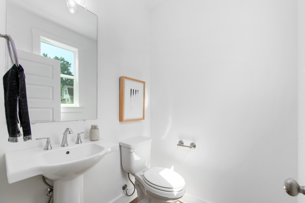 422 Creative Way Madison, TN 37115 - Photo 17 of 42 a bathroom with a toilet sink and mirror