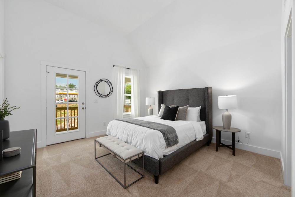 422 Creative Way Madison, TN 37115 - Photo 19 of 42 a spacious bedroom with a bed and a window