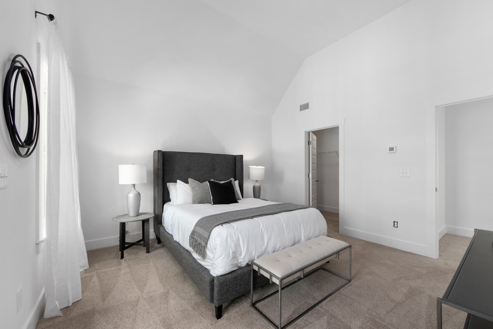 422 Creative Way Madison, TN 37115 - Photo 20 of 42 a bedroom with a bed and a chair