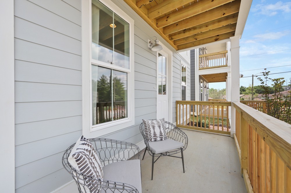 422 Creative Way Madison, TN 37115 - Photo 3 of 42 a balcony with wooden floor and furniture