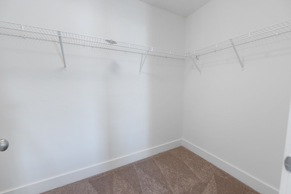 422 Creative Way Madison, TN 37115 - Photo 21 of 42 a view of a room with racks on the wall