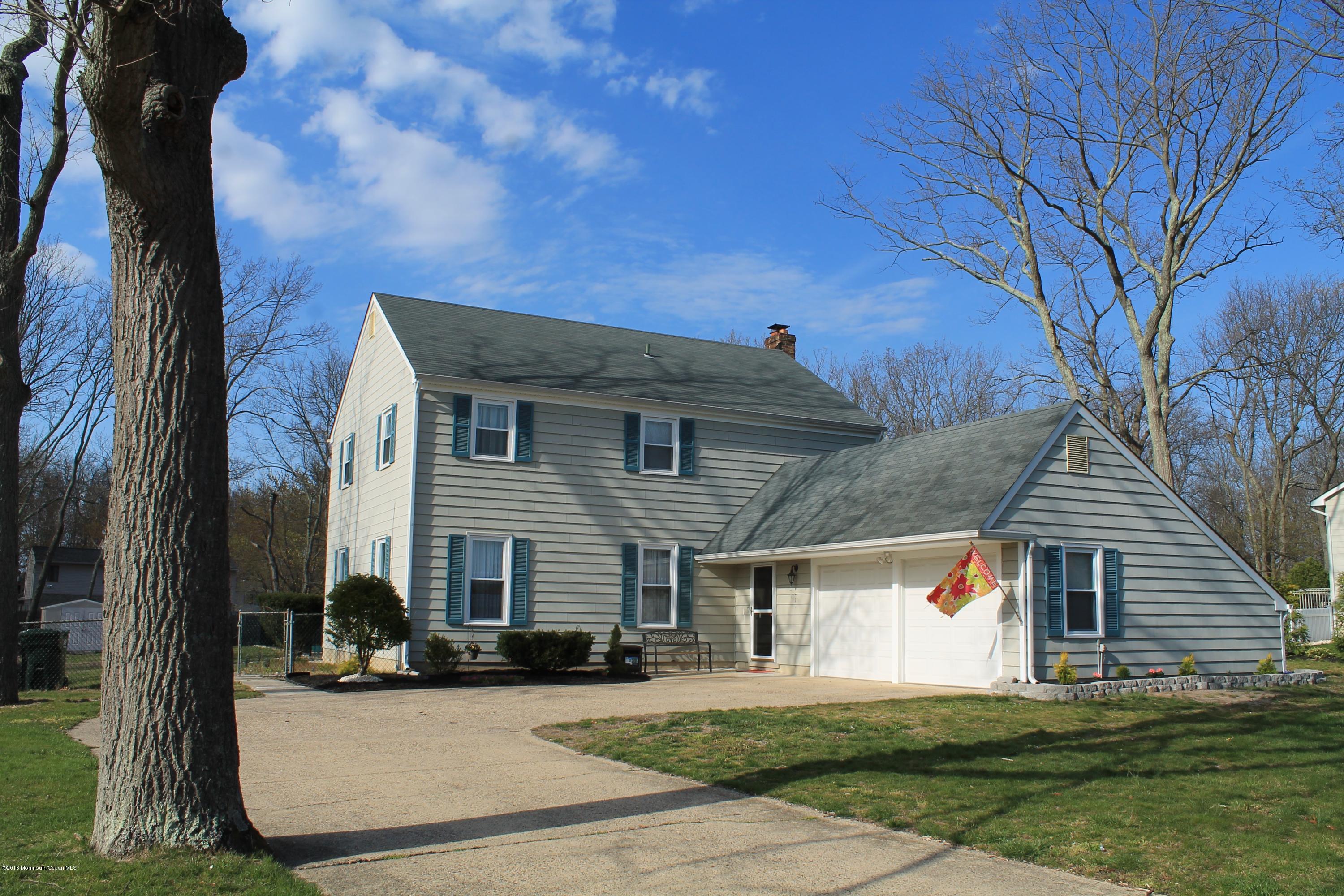 13 Partree Road Jackson, NJ 08527 - Photo 1 of 17 a front view of a house with a yard