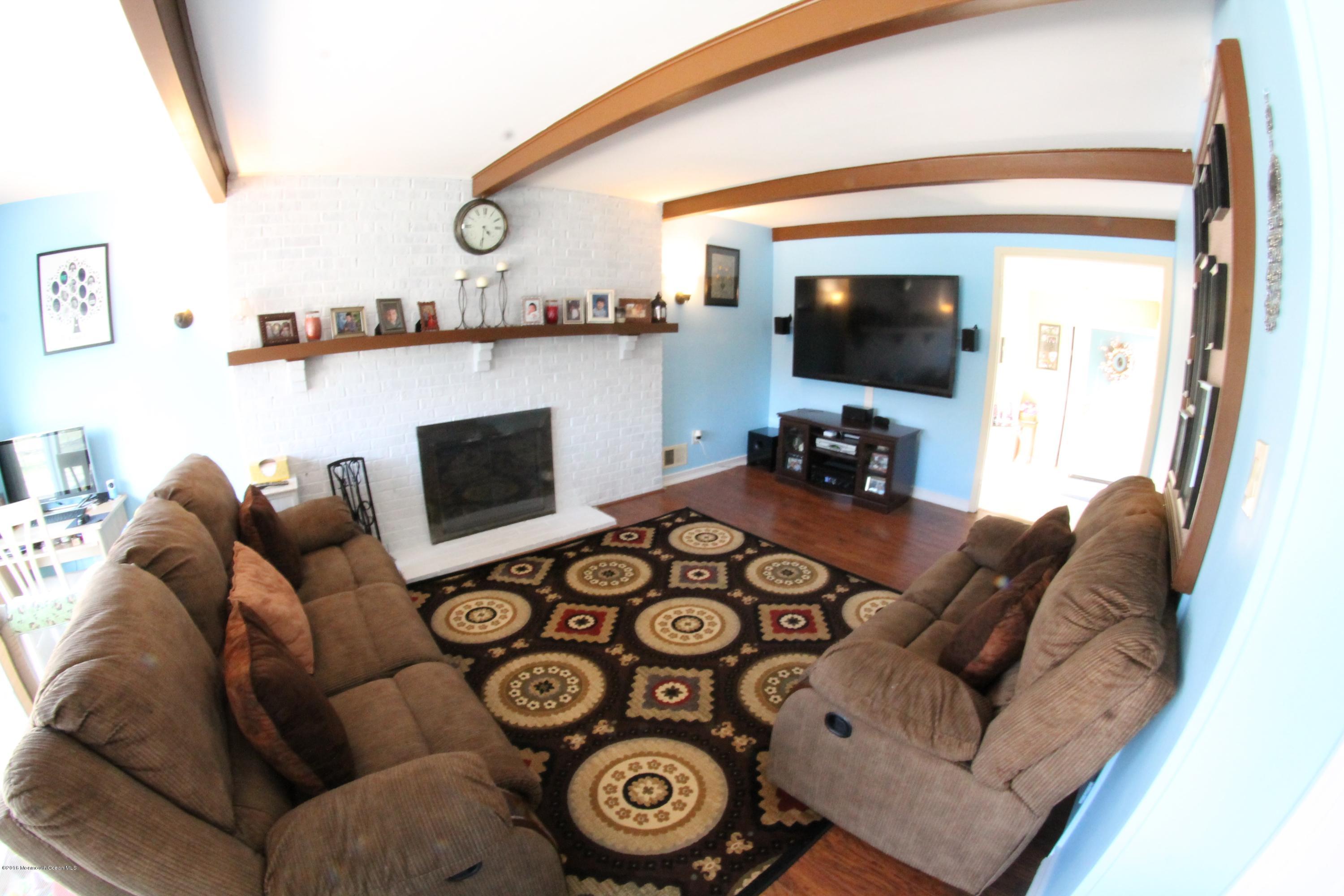 13 Partree Road Jackson, NJ 08527 - Photo 5 of 17 a living room with furniture and a flat screen tv