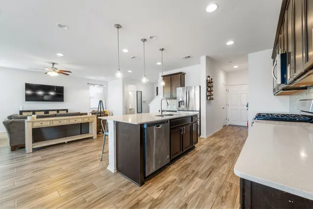 a view of a swimming pool with an outdoor seating