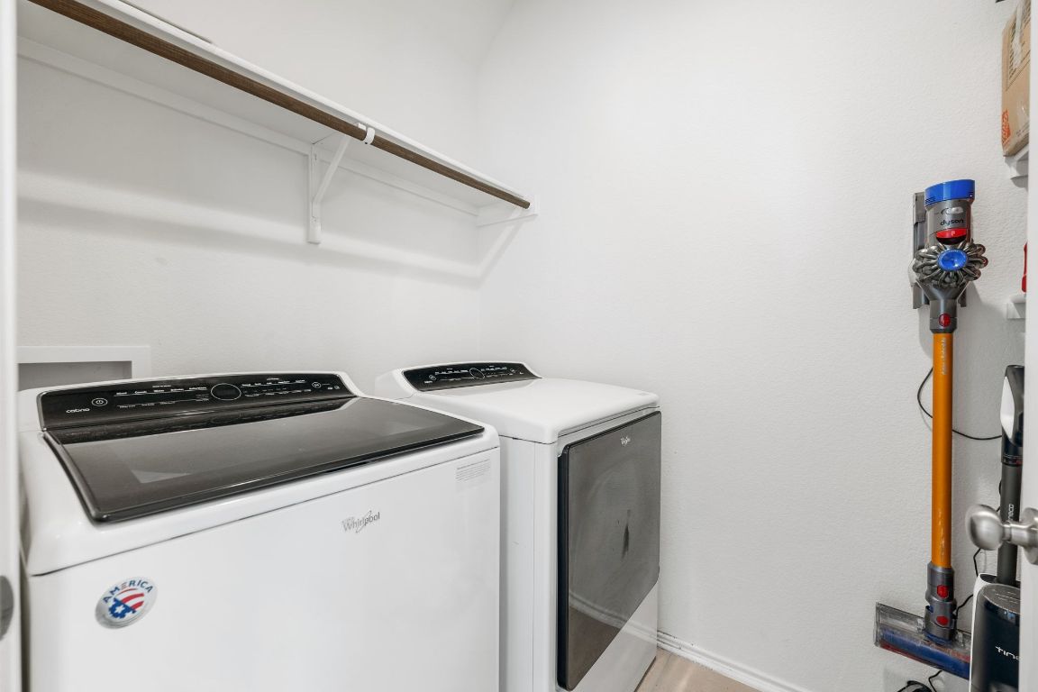 1902 Tasmanian Tiger Trace Austin, TX 78728 - Photo 21 of 29 a utility room with dryer and washer