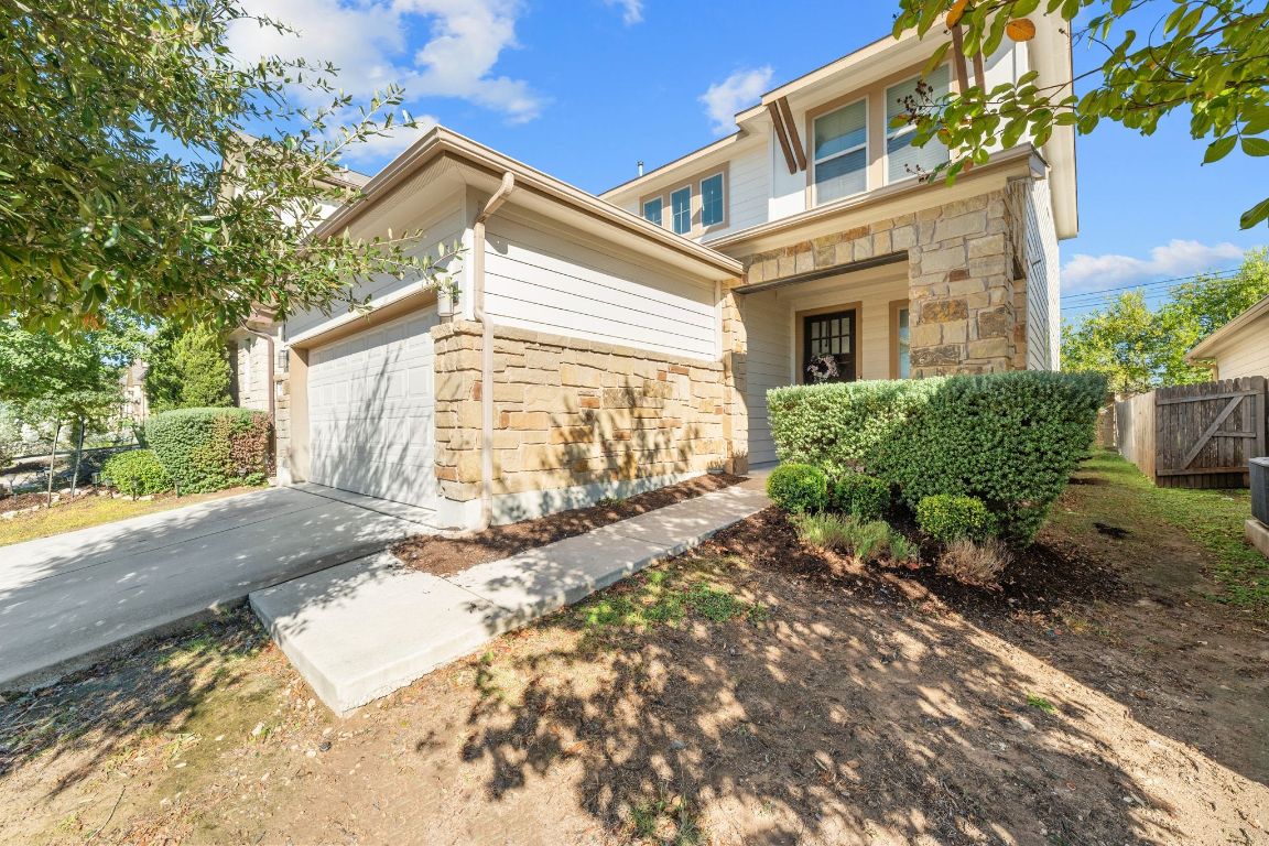1902 Tasmanian Tiger Trace Austin, TX 78728 - Photo 24 of 29 a view of a house with a yard