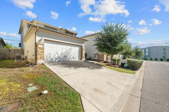 a view of yard with swimming pool