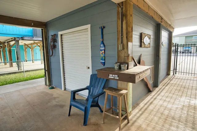 a balcony with table and chairs