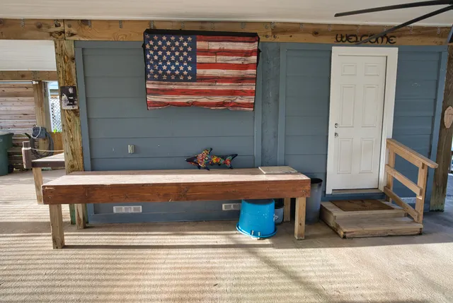 a view of a building with sitting area