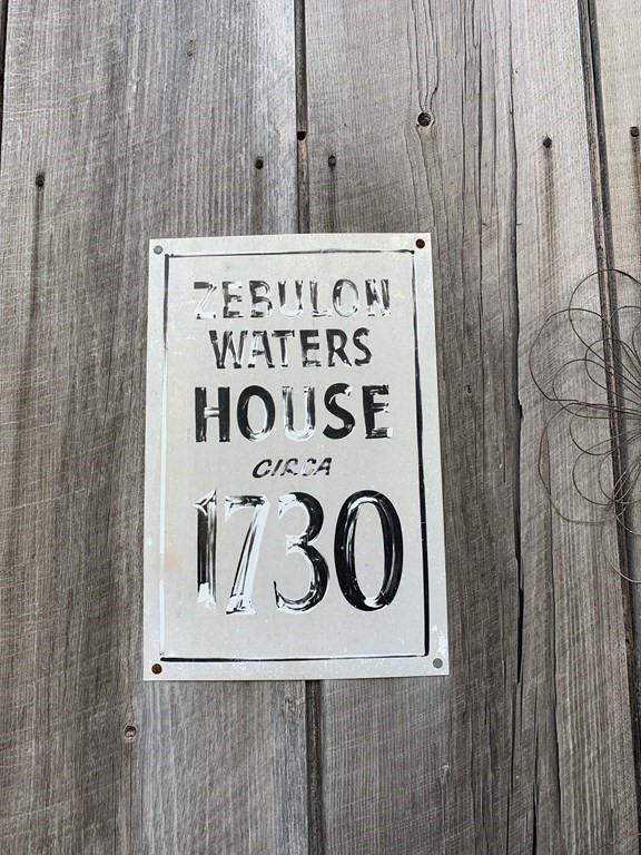 1481 Bay Road Sharon, MA 02067 - Photo 4 of 29 a close up of a sign