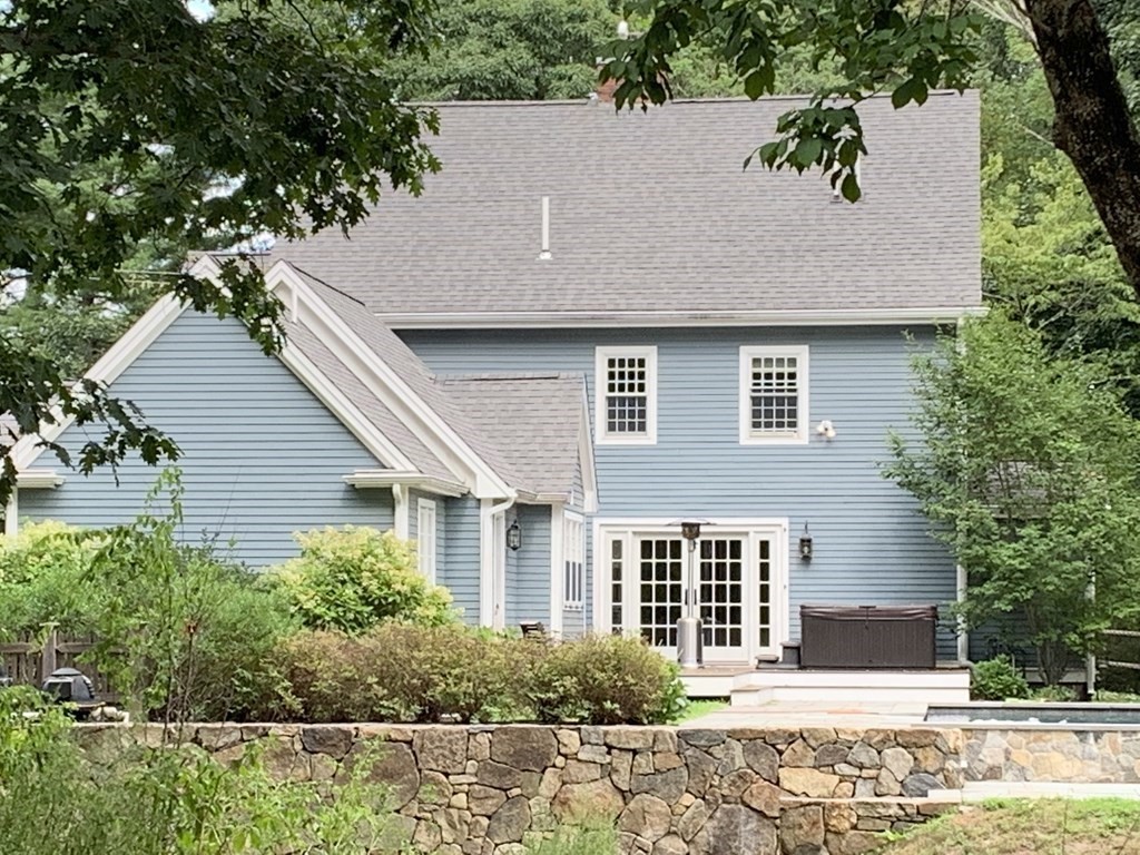 1481 Bay Road Sharon, MA 02067 - Photo 5 of 29 front view of a house with a yard