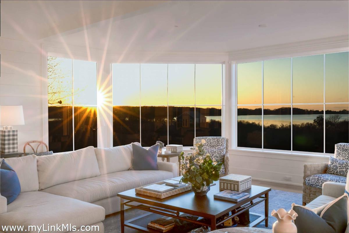 256 Polpis Road Nantucket, MA 02554 - Photo 4 of 30 a living room with furniture kitchen view and a large window