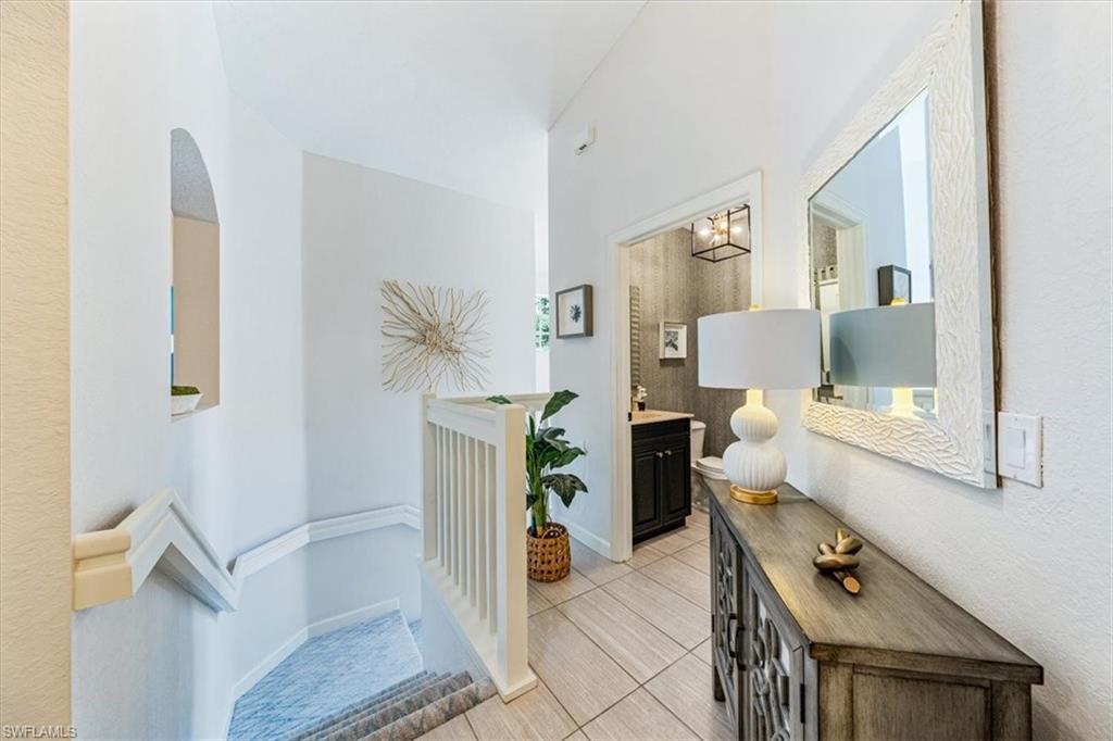 20280 Burnside Place, Unit 1202 Estero, FL 33928 - Photo 13 of 42 a view of living room with furniture and rug