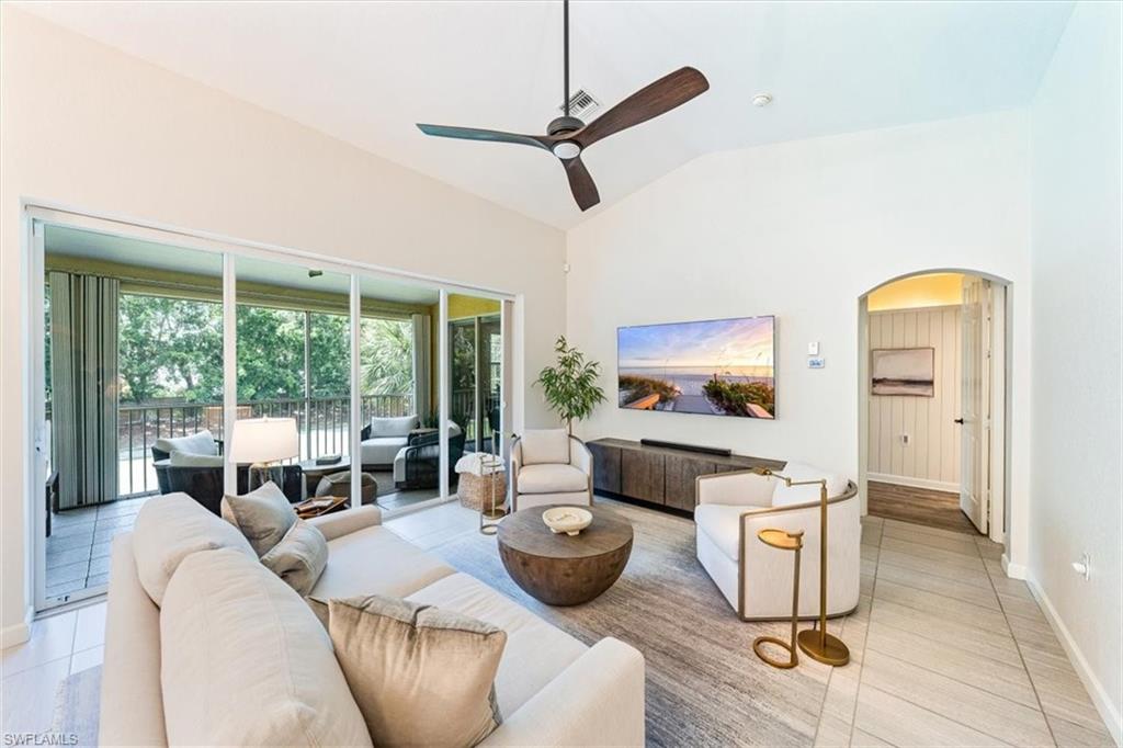 20280 Burnside Place, Unit 1202 Estero, FL 33928 - Photo 21 of 42 a living room with furniture and a window
