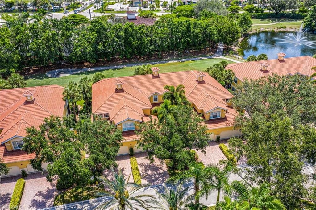 20280 Burnside Place, Unit 1202 Estero, FL 33928 - Photo 37 of 42 an aerial view of a house with yard swimming pool and outdoor seating