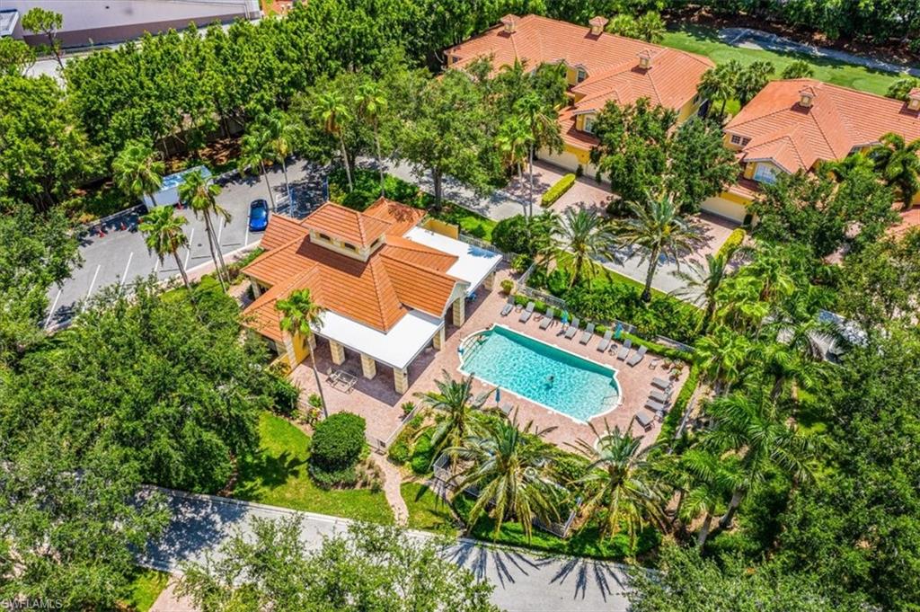 20280 Burnside Place, Unit 1202 Estero, FL 33928 - Photo 42 of 42 an aerial view of a house with a yard and lake view