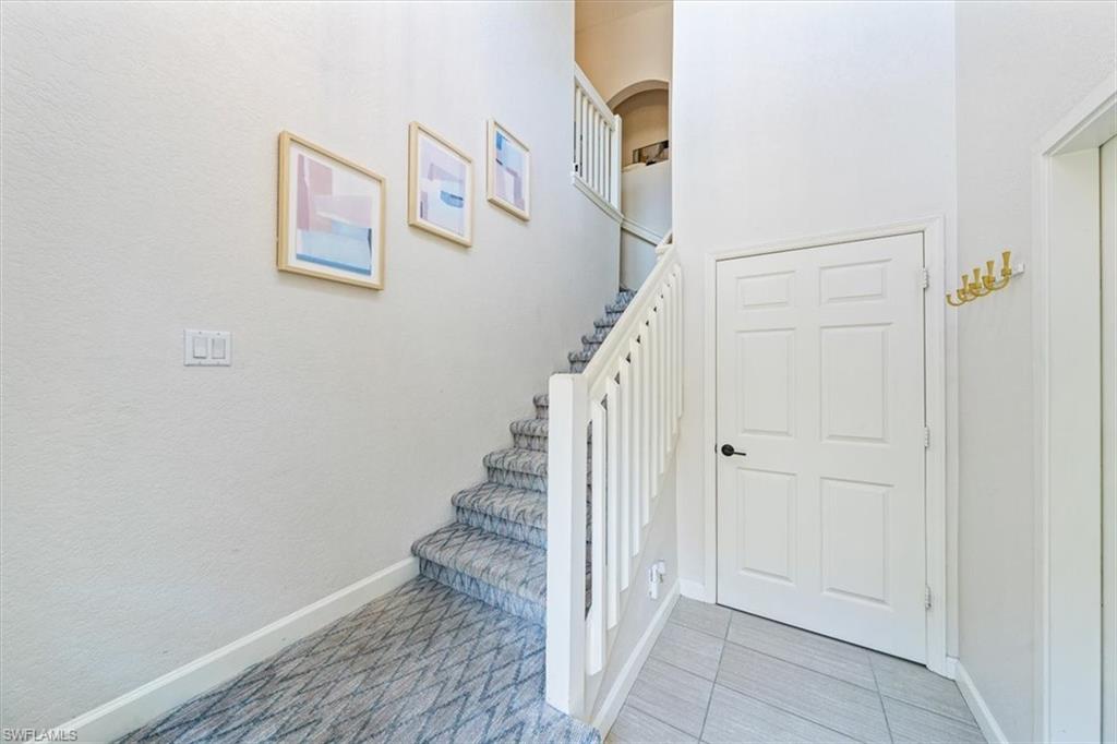 20280 Burnside Place, Unit 1202 Estero, FL 33928 - Photo 7 of 42 a view of entryway with stairs