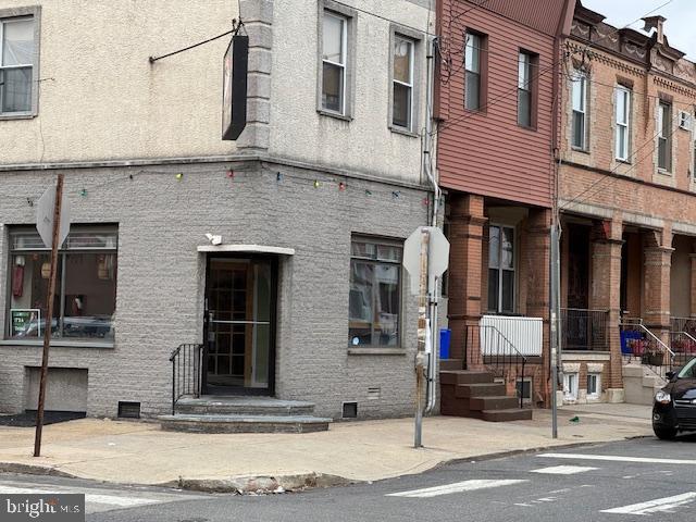 2240 South 12th Street Philadelphia, PA 19148 - Photo 2 of 23 a building that has a sign on it