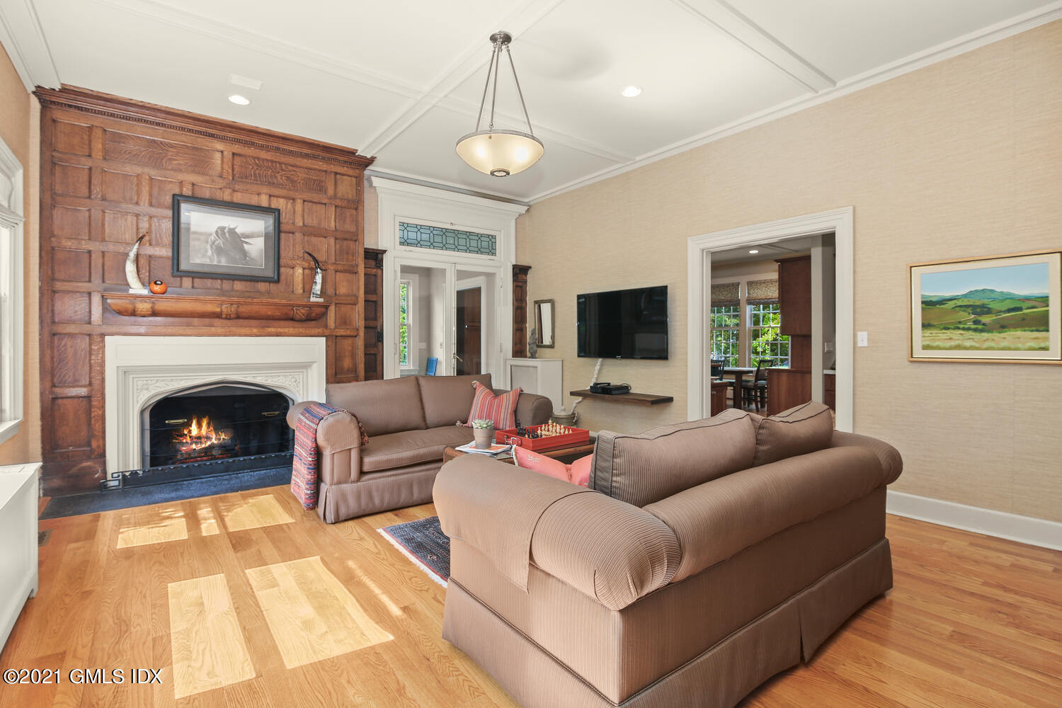 1 North Street Greenwich, CT 06830 - Photo 12 of 36 a living room with furniture and a fireplace