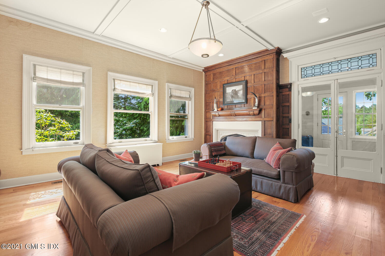 1 North Street Greenwich, CT 06830 - Photo 13 of 36 a living room with furniture and a large window