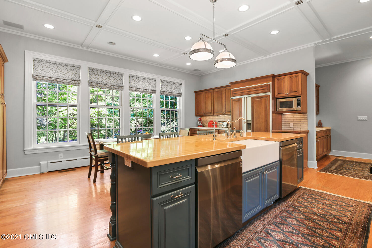 1 North Street Greenwich, CT 06830 - Photo 17 of 36 a kitchen with stainless steel appliances granite countertop a stove and cabinets
