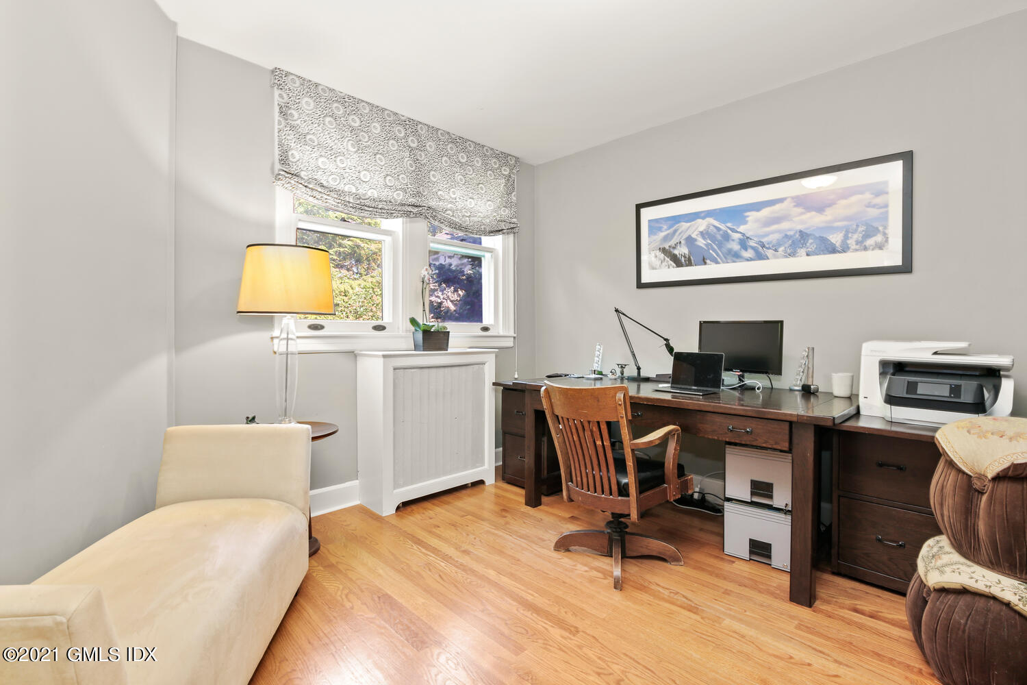 1 North Street Greenwich, CT 06830 - Photo 19 of 36 a view of a workspace with furniture and a window