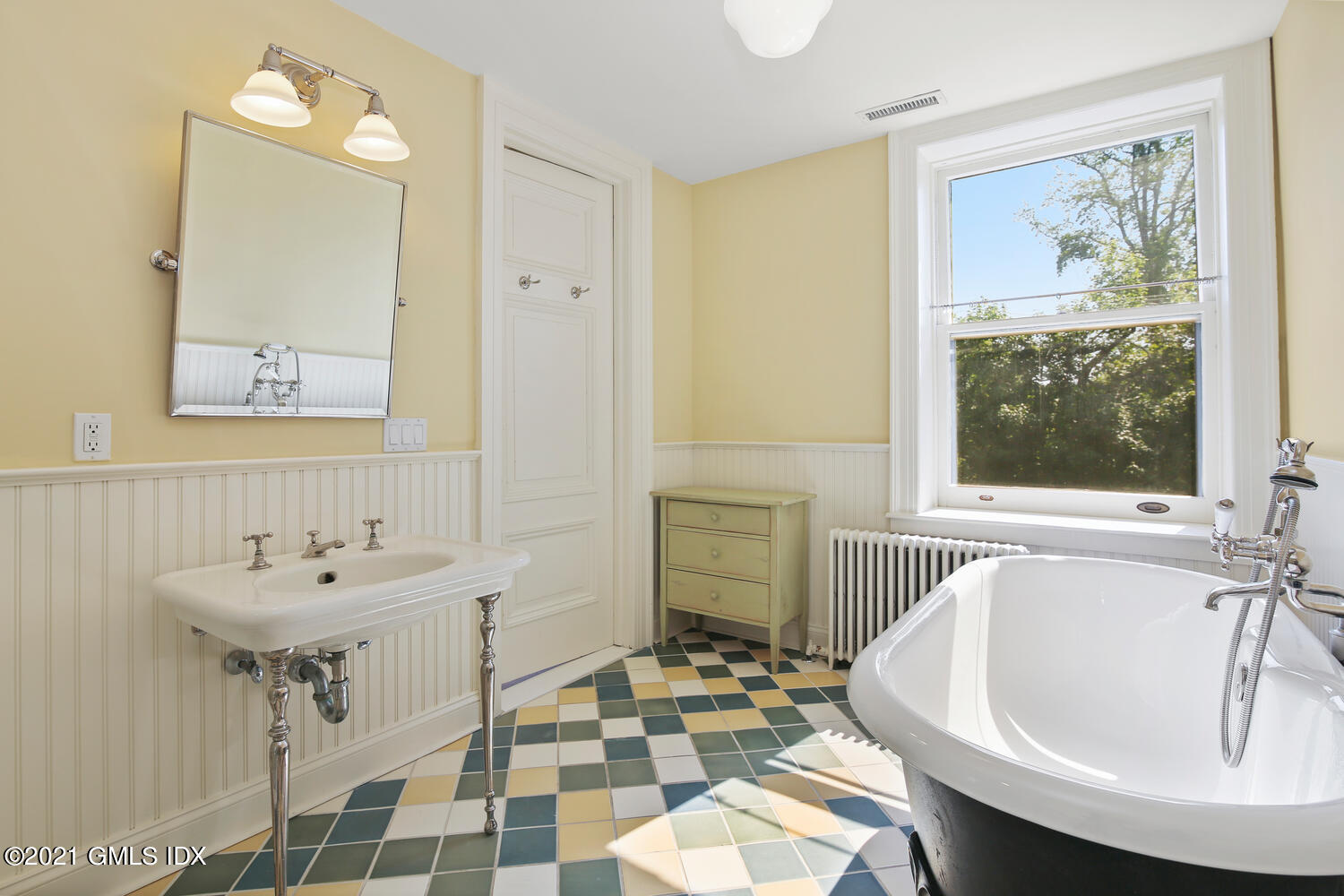 1 North Street Greenwich, CT 06830 - Photo 27 of 36 a bathroom with a sink and a mirror