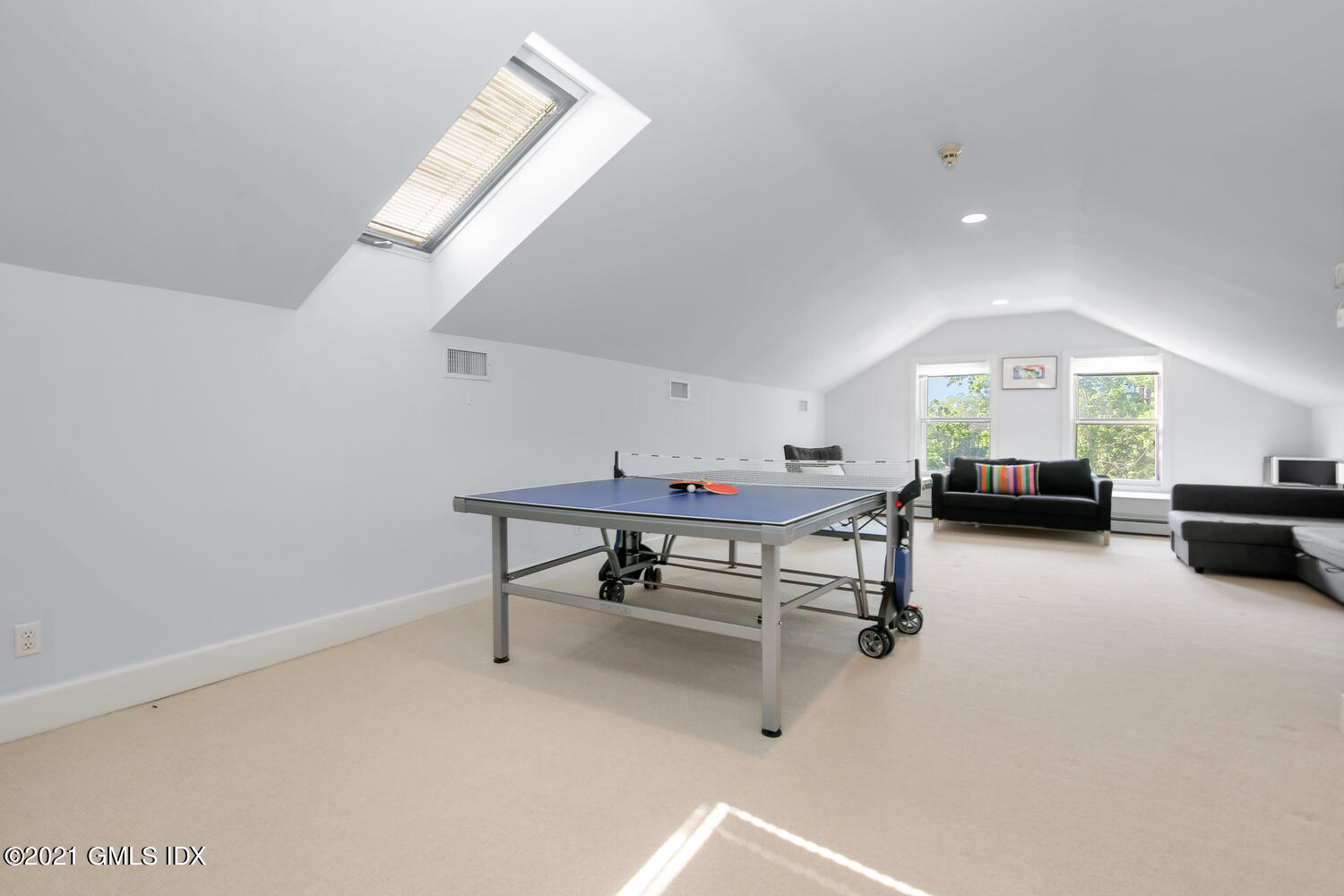 1 North Street Greenwich, CT 06830 - Photo 28 of 36 a living room with furniture and a window