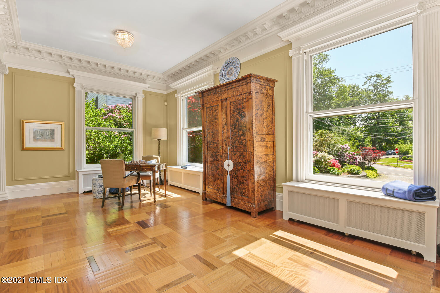 1 North Street Greenwich, CT 06830 - Photo 8 of 36 a dining room with furniture and a window