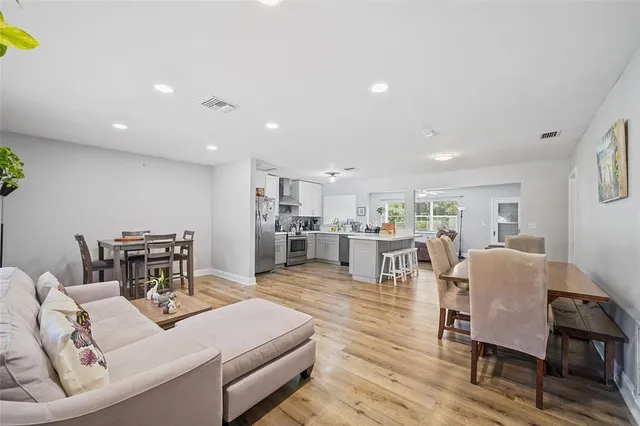 a living room with furniture and a table