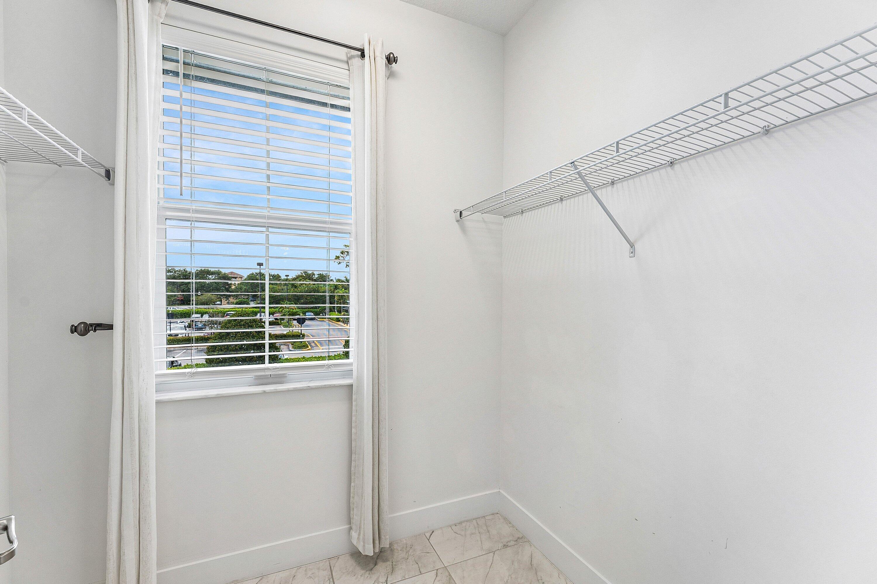 4821 Pointe Midtown Road Palm Beach Gardens, FL 33418 - Photo 19 of 34 Guest 1 Walk-In Closet