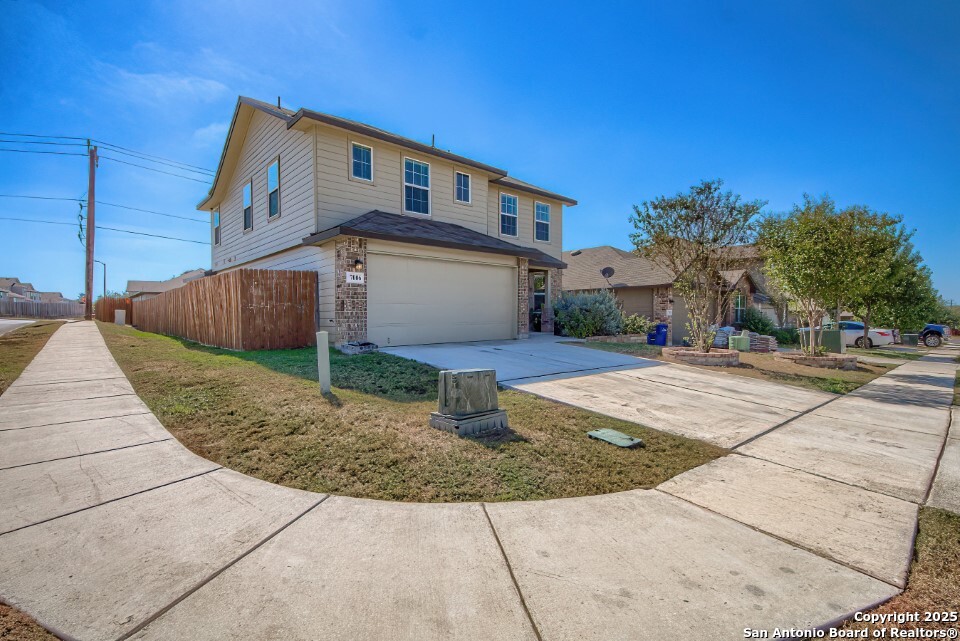 7006 Quantum Loop San Antonio, TX 78252 - Photo 1 of 37 a front view of a house with entertaining space