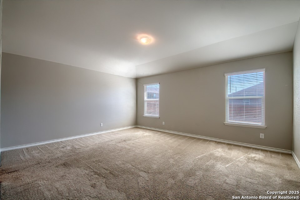 7006 Quantum Loop San Antonio, TX 78252 - Photo 13 of 37 an empty room with windows