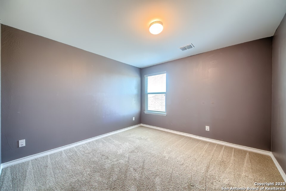 7006 Quantum Loop San Antonio, TX 78252 - Photo 24 of 37 an empty room with windows